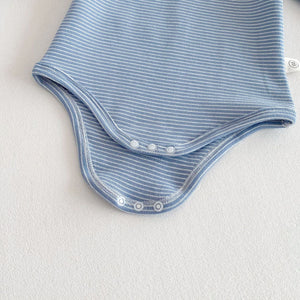 Discover the Comfort and Style of Our Striped Triangle Baby Romper