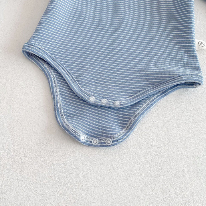 Discover the Comfort and Style of Our Striped Triangle Baby Romper